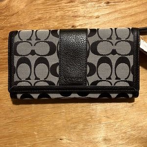 Black Coach Signature wallet with check book & pen holder. New with tag.